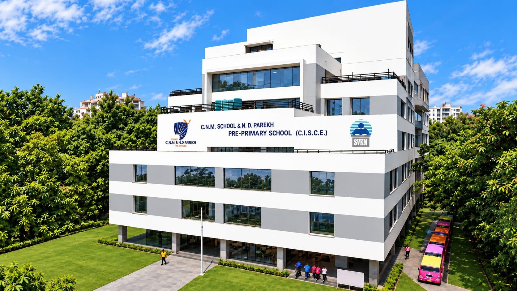 The CNMS school building surrounded by trees