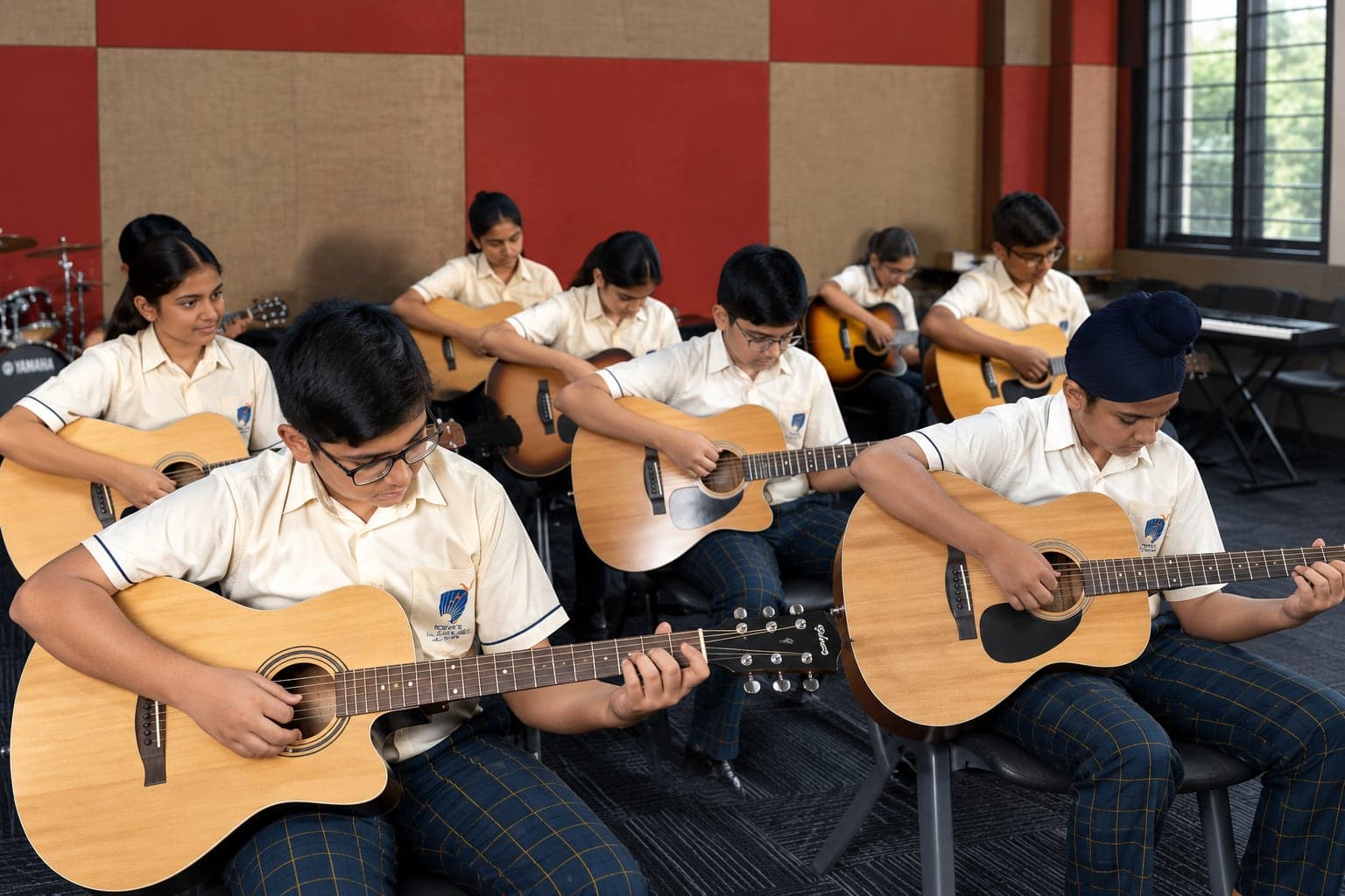 Students playing guitars