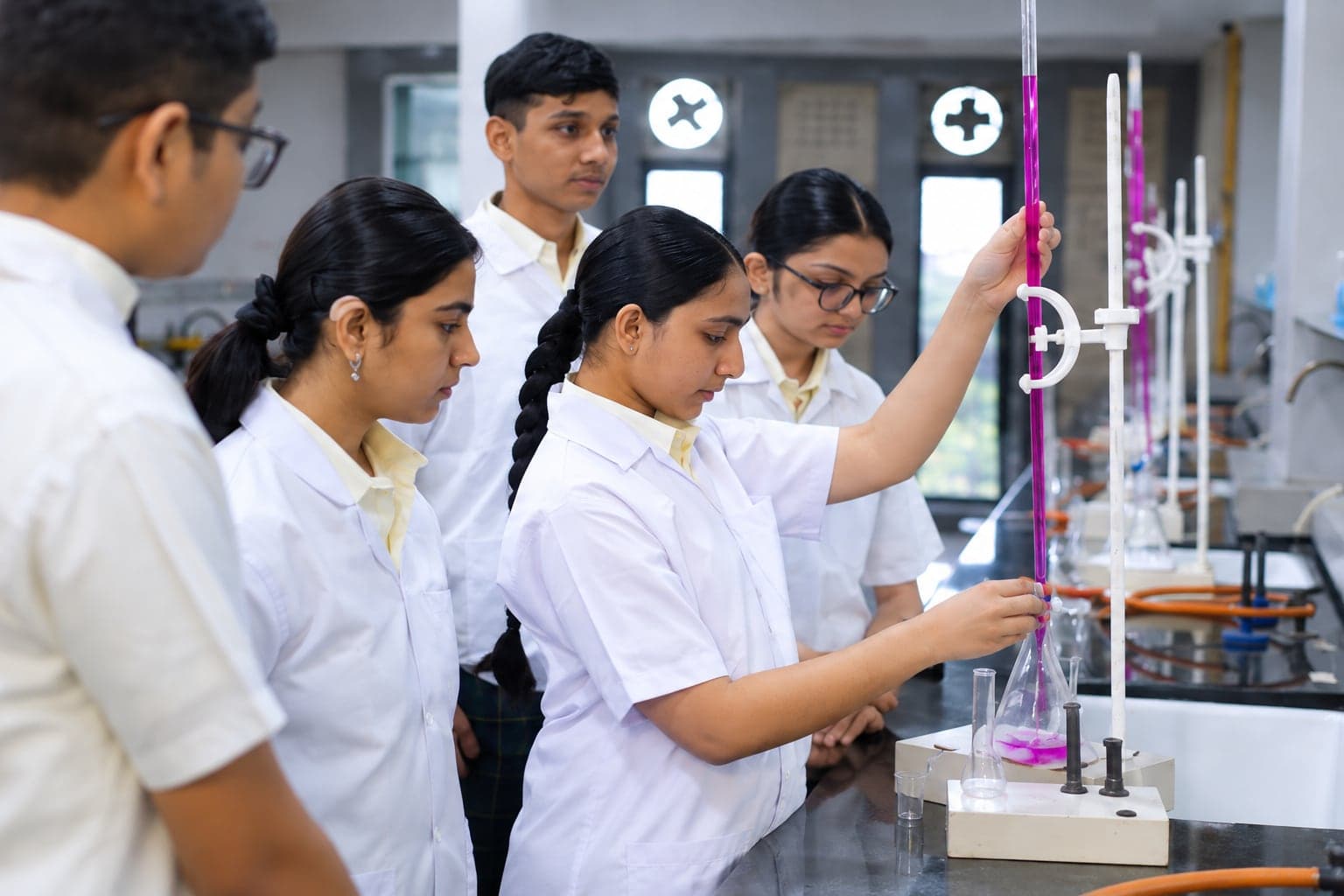 Students working with lab equipment