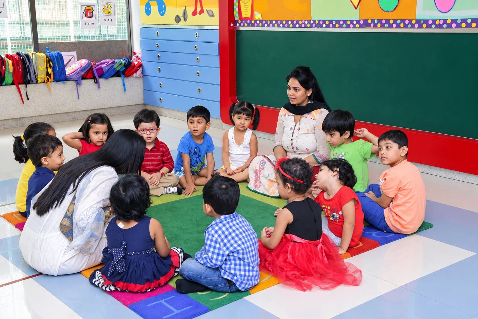 Pre-Primary children sitting together on the classroom carpet
