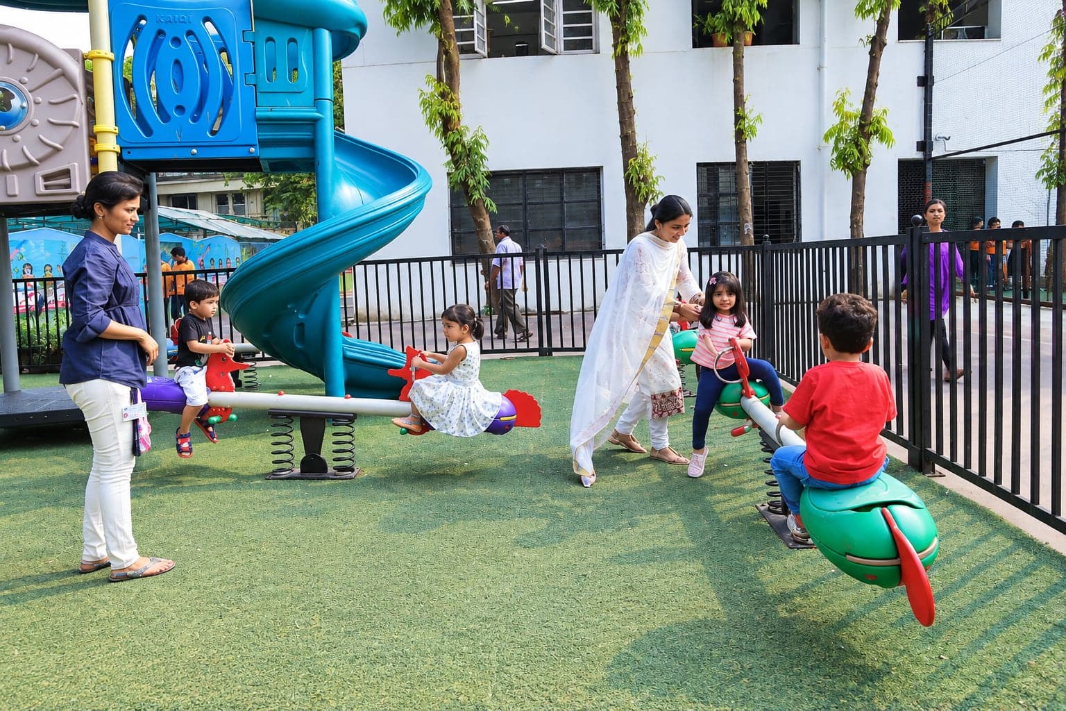 Pre-Primary children playing on an outdoor play area